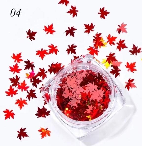 Nail art maple leaves autumn motif fire red