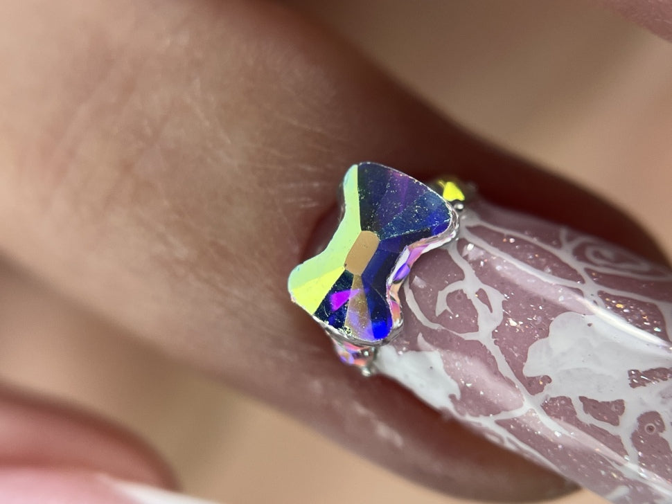 Strass gemme "Fascetta iridescente" 6 pz. (6mmx4,5mm)