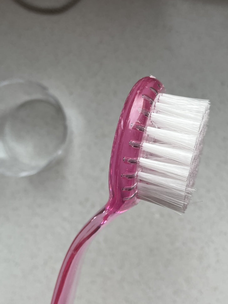 Ergonomische Staubbürste rund rosa